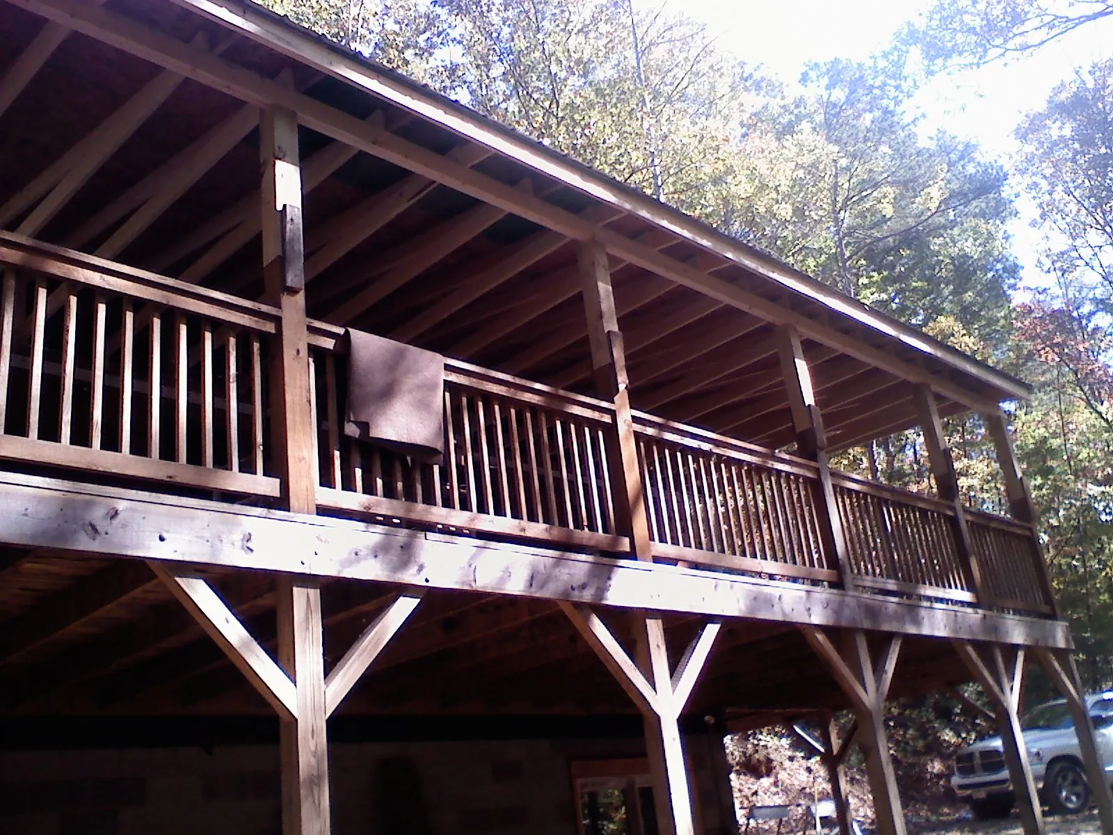 Timber framing under a new elevated porch and deck — Roof Leak Repair in Newaygo by Roofing Brothers